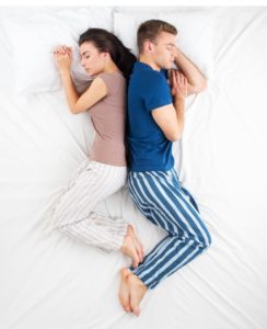 Couple Sleeping back-to-back